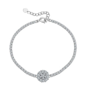 Silver cluster tennis bracelet with floral CZ centre, lobster clasp and extender chain on white