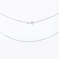 Silver chain necklace on a white background