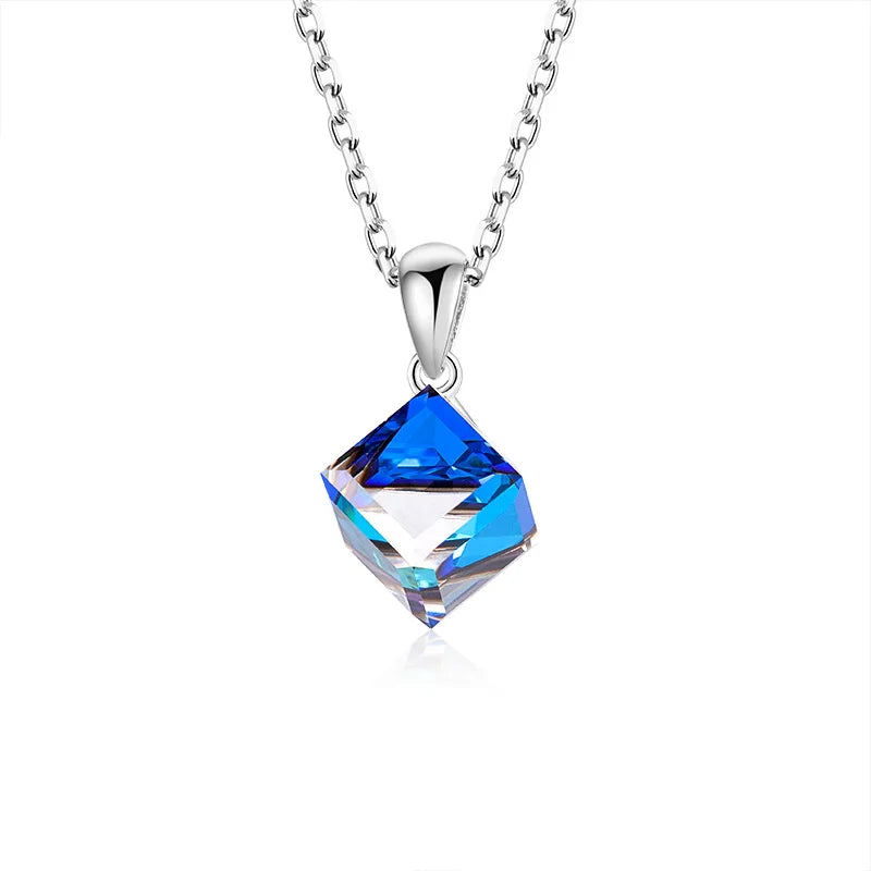 Blue crystal pendant necklace on a white background