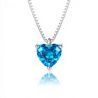 Heart-shaped blue gemstone necklace on a white background