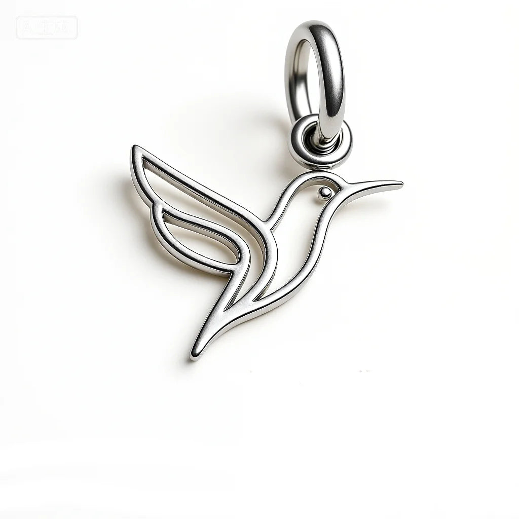 Silver hummingbird pendant on a white background