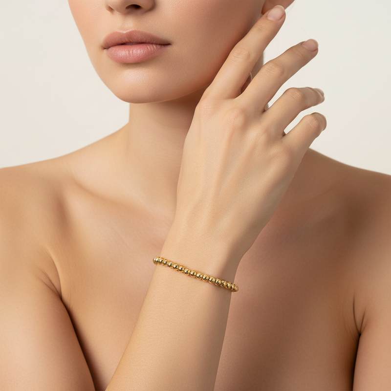 Gold vermeil 4 mm bead bracelet worn close on the wrist