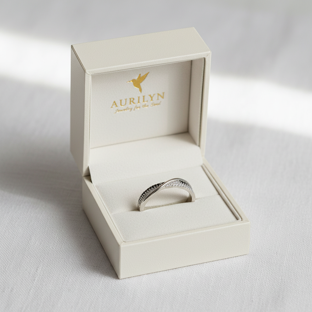 Flat lay with twist ring on branded box