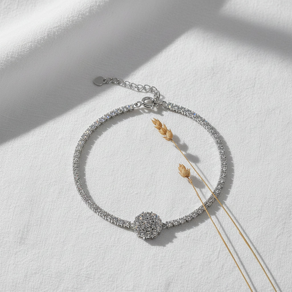 Silver bracelet flat lay composition