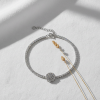 Silver bracelet flat lay composition